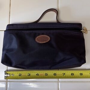 Longchamp purple nylon cosmetics bag